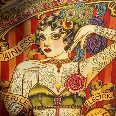 LibraTiger74's profile picture. She/her