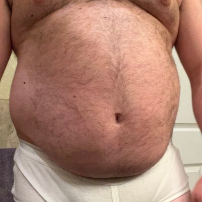 Lover of bellies, beards, and big balls. The bigger the better!