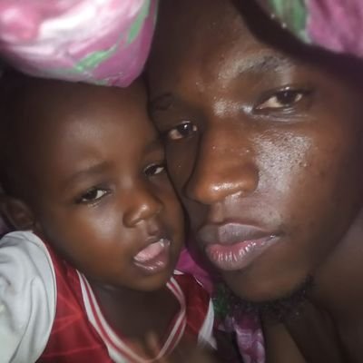 JosephKiwanuk13's profile picture. Real man and two kids