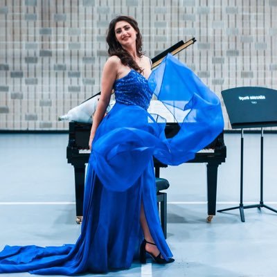 Italian-Australian soprano, Principal Artist Opera Australia, Soloist Stradivarius Milano, Churchill Fellow