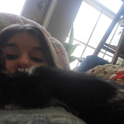 _nerdy_birdy's profile picture. my profile is a picture of me crying on my cat but i think it's a good representation of me