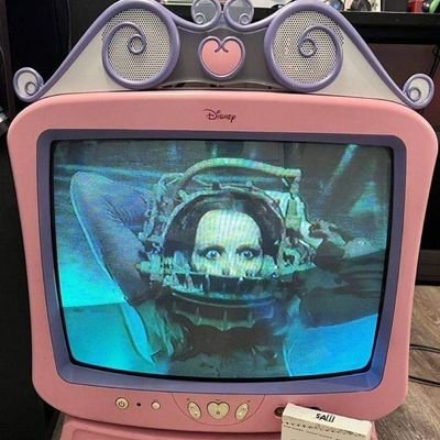 just a SAW movie playing on a pink Disney Princess TV with a built in DVD player.