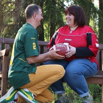 Proud CFL & Calgary Stamps fan living in #yeg. CFL season ticket holder (I’m the one in red & white) with my wonderful husband. #stampsfaninyeg