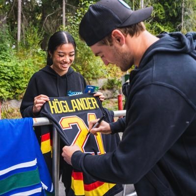 that orca hat girl | nucks, jays