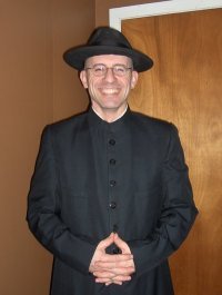 Despite the photo, I'm not a priest.   I like reading, dogs and writing letters.  PM me your address and I might send you a letter.