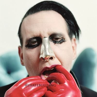 I'm God. I make GIFs. I was bullied in high school. I hate you all. I'm heterosexual. If you don't follow me, you're not a true @marilynmanson fan