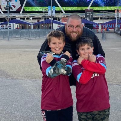 Dad, 2 Crazy boys who like me follow Kettering Town and West Ham United