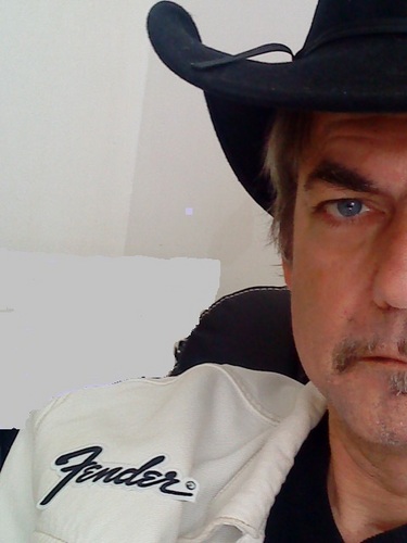 LonestarTrenton's profile picture. Cowboy guitar player _ play clear as countrywater