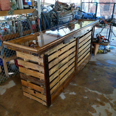 Builder of furniture using reclaimed wood.