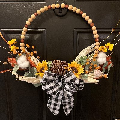 Creator of Boho beaded wreaths. I specialize in hand made unique quality wood beaded wreaths to make your home beautful.