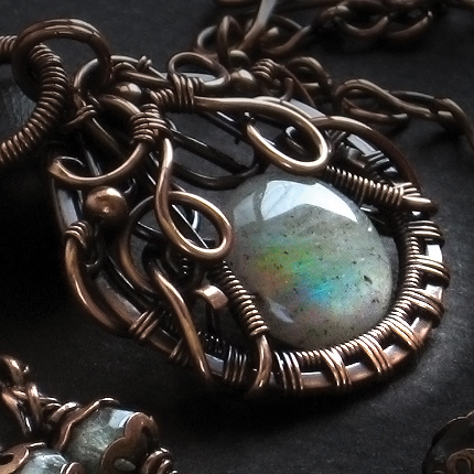 Artisan jewelry designer renown for her upscale hand crafted, intricate and flowing designs from precious wire metals using colored gemstones and crystals.