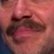 I am Sam Riegel's Mustache. A radioactive cocktail of absinthe, espresso, and yogurt turned me sentient. I use this gift to make dumb jokes on twitter.