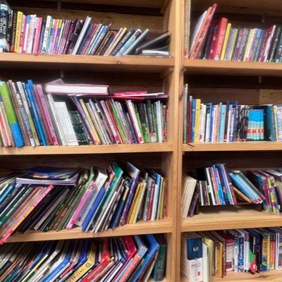 Just pictures of random bookshelves in thrift type stores. And their locations. Please add your own.