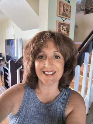 wife, mother, grandmother, teacher, worshiper, child of God