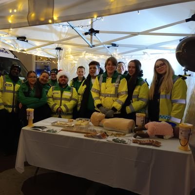 Vibrant team training and practising First Aid in Radyr community and Cardiff area