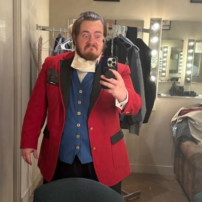 A man in his twenties who dabbles in musical theatre and aims to become a theatre teacher.