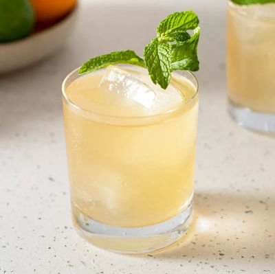 1 ounce bourbon

1 ounce gin

1 ounce fresh lime juice

 1 dash Angostura bitters

4 ounces chilled ginger ale