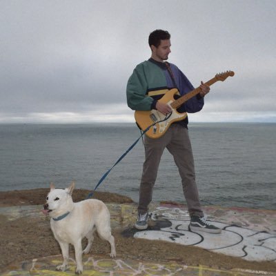 A man with a guitar and a dog 🕺🎸🐶 https://t.co/eobfq8GTKt