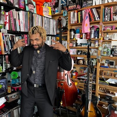 Your neighborhood Black roots musician who will definitely cry if you call his instrument a cello