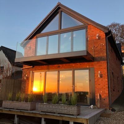 New Ultimate Luxury Beach Side Detached Holiday Accommodation on Filey Sea Front. Offering Stunning Panoramic Views of Filey Bay. Designer interior & Parking.