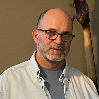 SavageDan's profile picture. I identify as a string bass player.