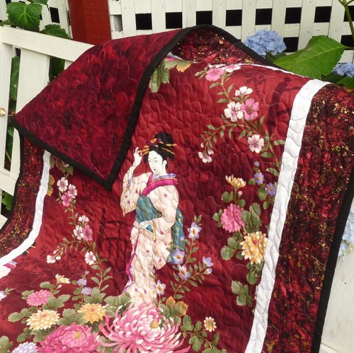 Beautiful handmade quilts, pillows, wall hangings, lap quilts, table throws, gifts and decor featuring stunning flowers, birds, fish, Asian subjects and more!