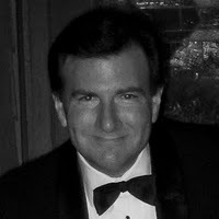 Technologist, lawyer, magician, photographer, and very happy husband and father.