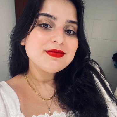 with a dreamy, far-off look and her nose stuck in a book 🌷 she/her