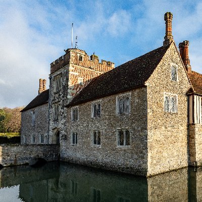 Medieval moated manor house with gardens and estate in Kent. National Trust.