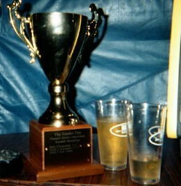 I am the championship trophy for the Tuman's Tavern Association fantasy baseball league, which was founded in 1999.