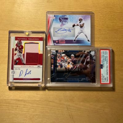 idk hopefully these cards pay for some cheap beer one day | PC: Ravens, Bama, Brady, Machado