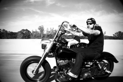 US Marine Vet with an old Harley, a couple old vans, a bunch of kids & animals, a couple dogs, & a smoking hot awesome wife. What else could a man ask for?