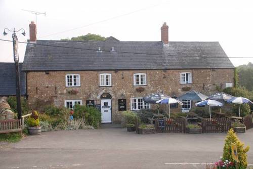 16th Century Country Pub & Inn, nestled in the beautiful hills of Nettlecombe. 7 en-suite rooms. Our fine Restaurant offers freshly cooked, locally sourced food
