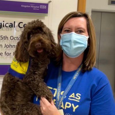 Pets As Therapy volunteer with Poppy the cockapoo