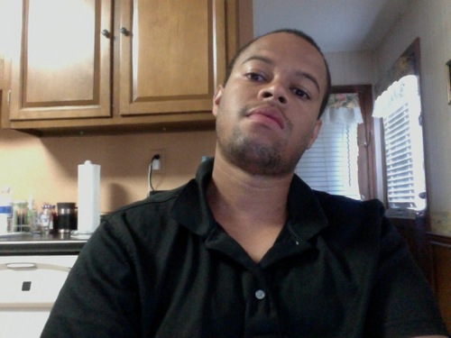 iamiconick's profile picture. Just a man holding a camera.