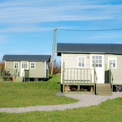 Collection of Premium Shepherds Huts providing luxury glamping for couples in Doolin with hot tub.