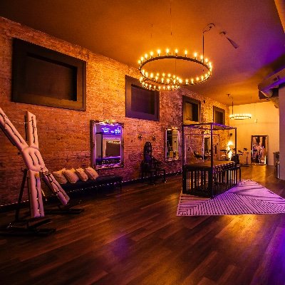 Chicago's one-of-a-kind visual media & private events venue featuring a luxury BDSM studio, sunlit lounge & elegant boudoir for photo, film, events & play!