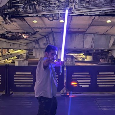 Disney Parks fanatic, unapologetic EPCOT fanboy, Gunpla addict, and Lightsaber enthusiast.