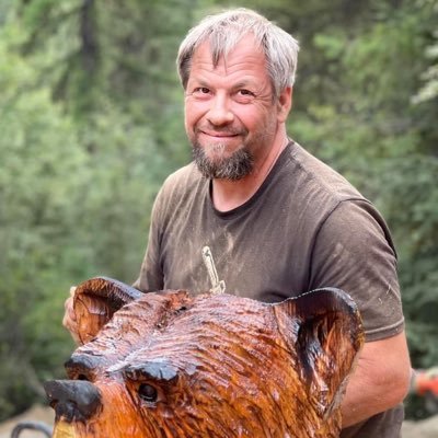 Alaska chainsaw carver artist ....creating life size fan art ....