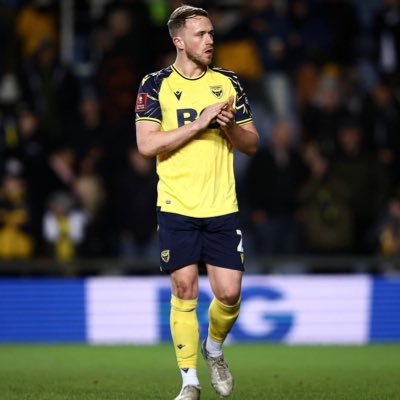 Professional footballer playing for Oxford United FC