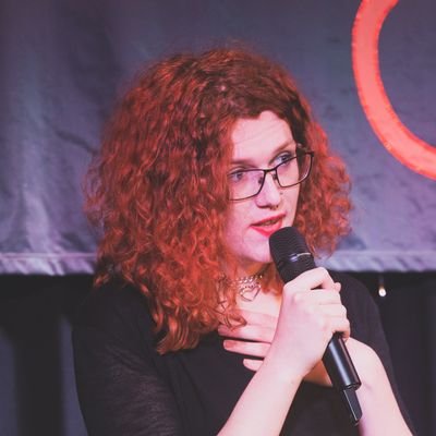 Giant woman with orange hair. Weiße esterreichische Kartoffel (Erdapfel).