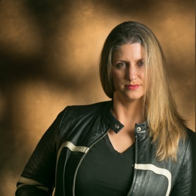 Retired Navy Chief Warrant Officer & Award-Winning Author of the Elle Anderson series: Shadow Game | The Deeper Shadow | Shadow War | A New Game