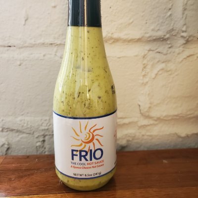 Frio a Queso based hot sauce with cilantro, lime, onion and garlic and a little kick.