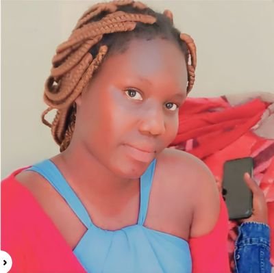 AnyangoEsther8's profile picture. Happy