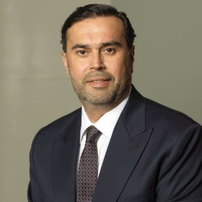 A professional architect and a business man involved in architectural, egineering, contracting, trading, hotel management, and waste treatment industries.