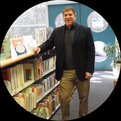 A teacher and two of his students advocating for STEM Access For All through a series of books called