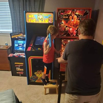 Pro wrestling fan for decades plus, 80s fanatic, pinball and arcade player. Father to the best son in the entire world.