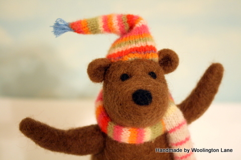 Handmade needle felted wool sculptures and felt accessories.