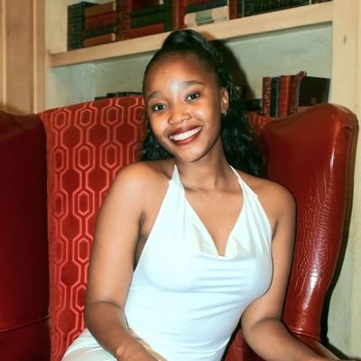 SweetSerene8's profile picture. She is clothed in strength and dignity.