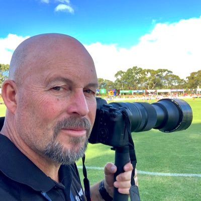 Just A Guy with a Camera capturing the action.